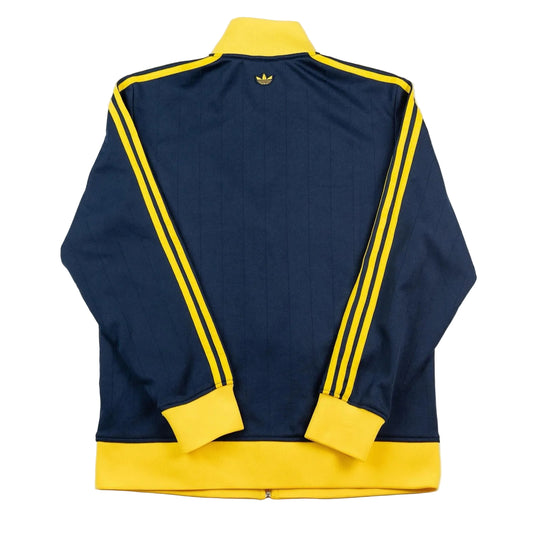 Navy and yellow tracksuit jacket with Adidas logo on a white background