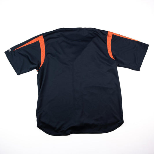 Black sports jersey with orange accents on a white background