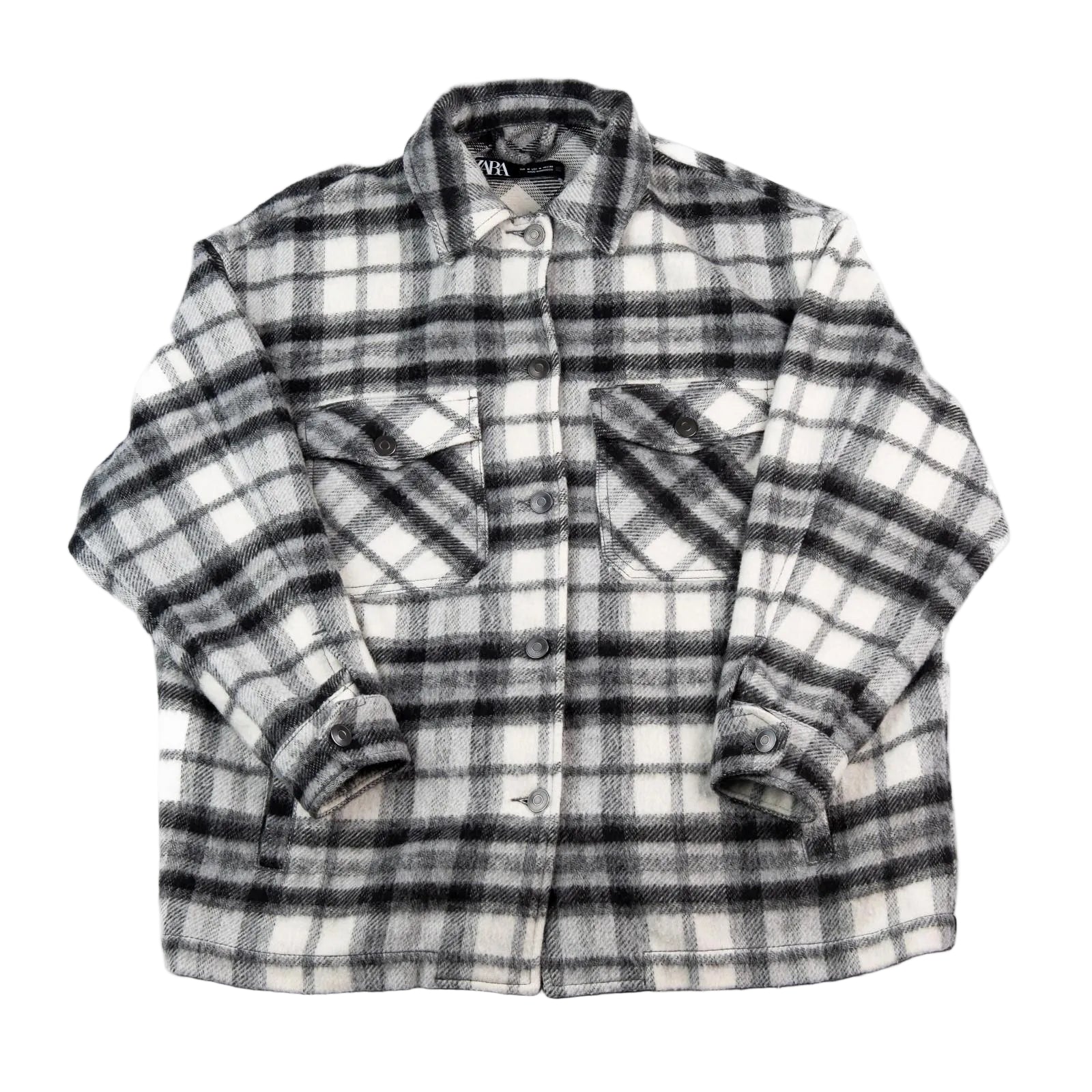 Plaid shirt with rolled-up sleeves on a white background