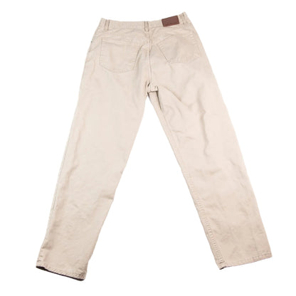 Beige pants with a brown belt on a white background