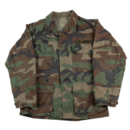 Camouflage military jacket with 'U.S. Army' branding on a white background