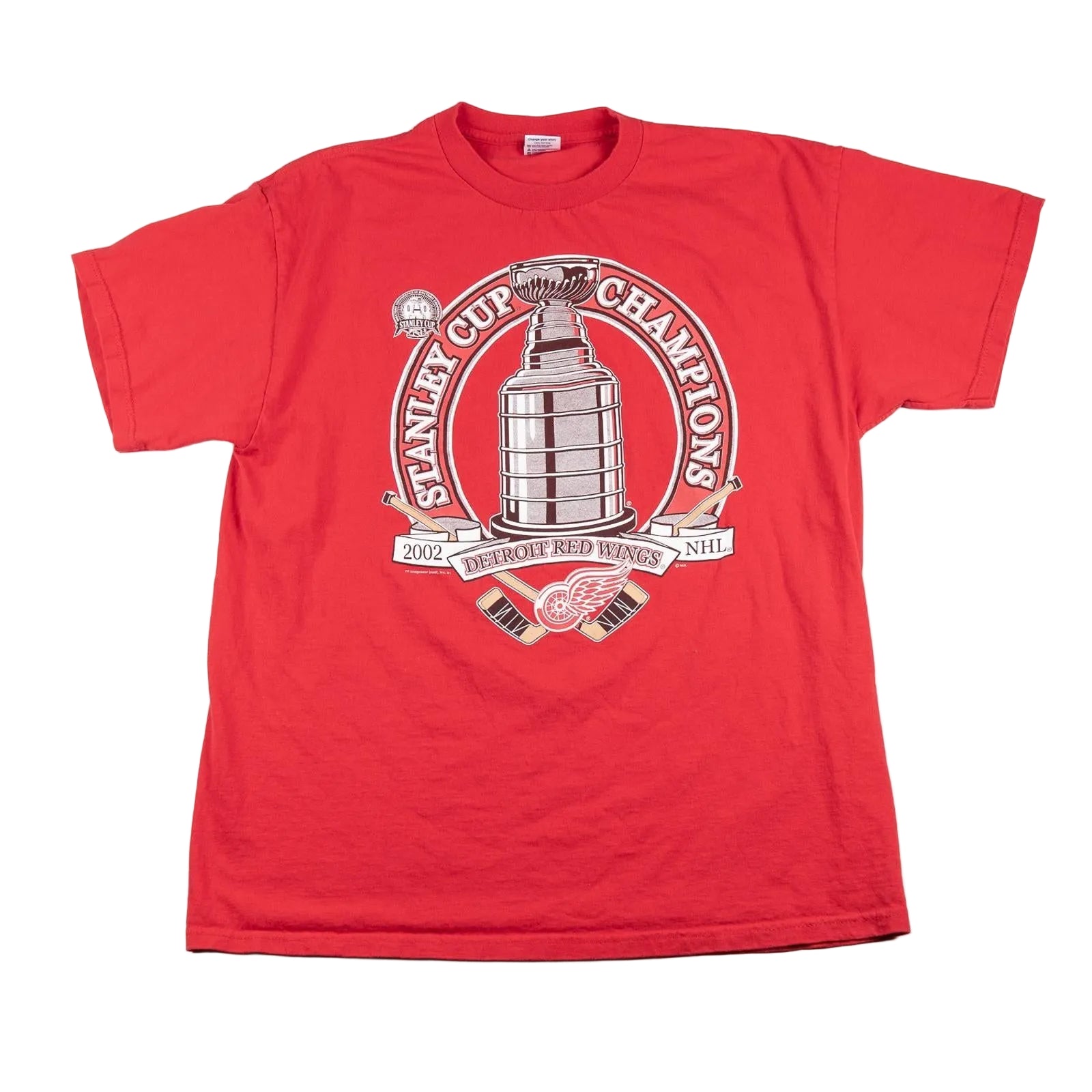 Red t-shirt with Stanley Cup Champions logo on a white background