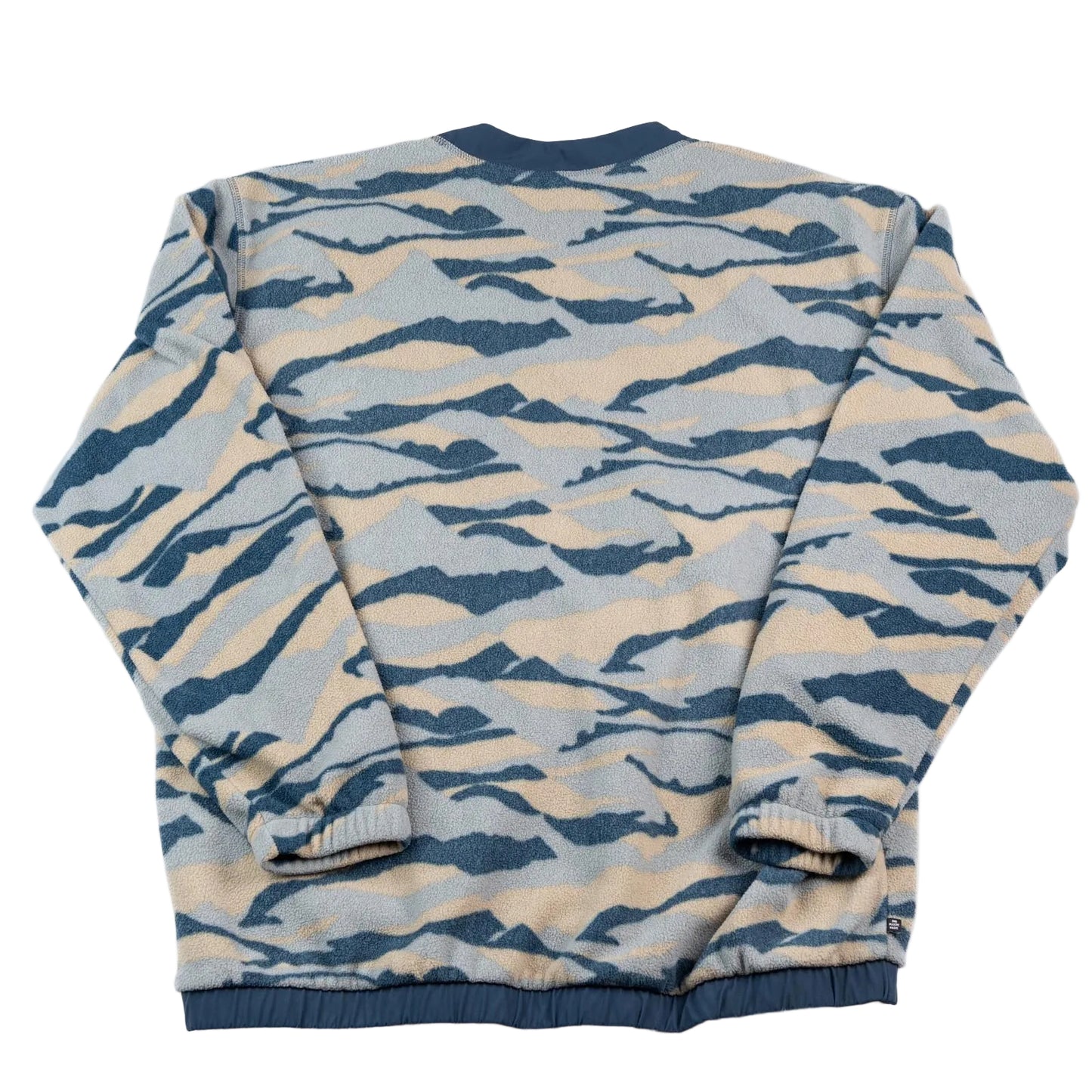 Camouflage-patterned sweater on a white background