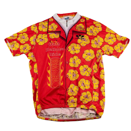 Red cycling jersey with yellow floral patterns on a white background