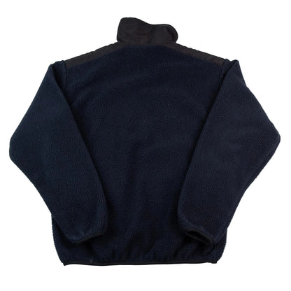 Folded black fleece jacket on a white background