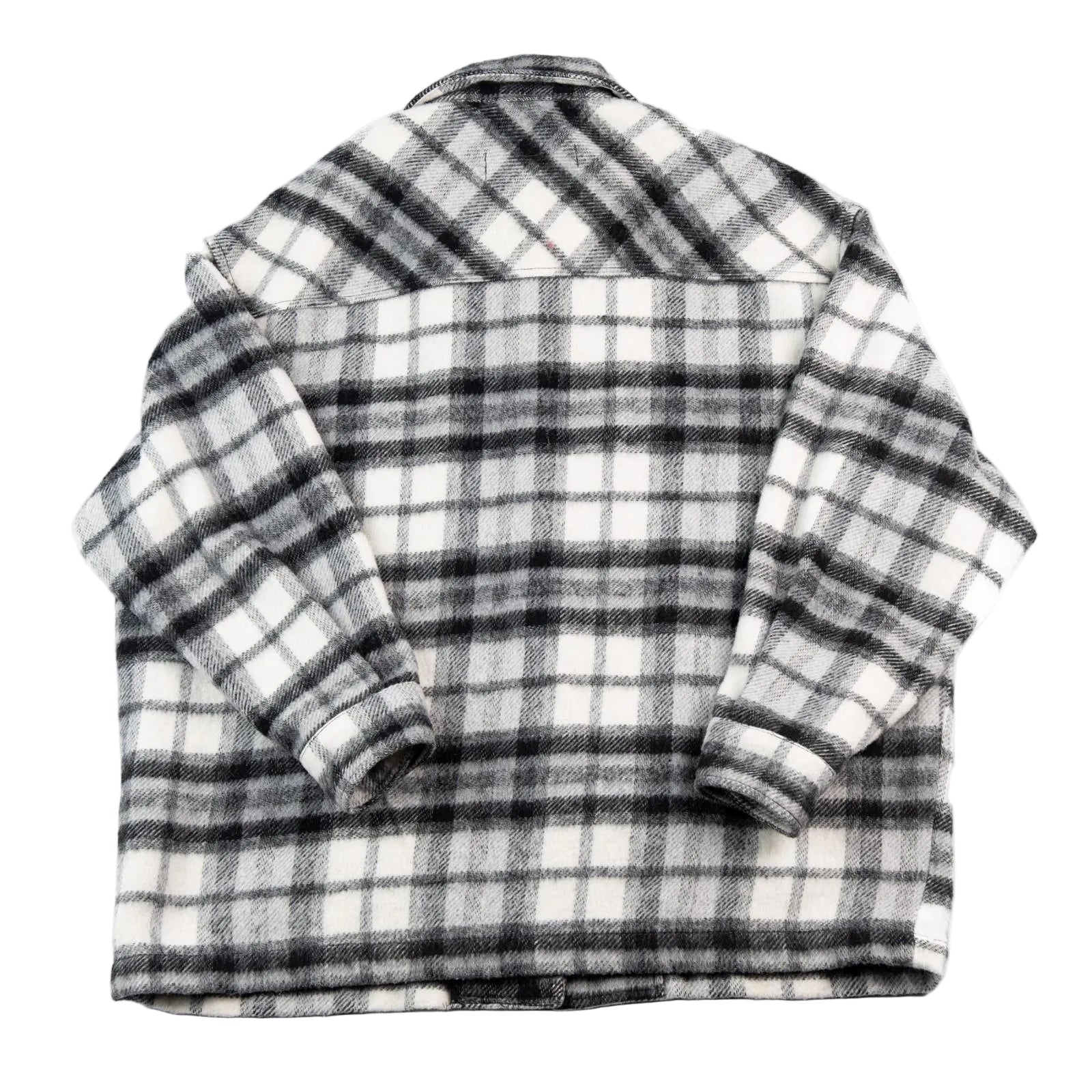 Folded black and white plaid shirt on a white background
