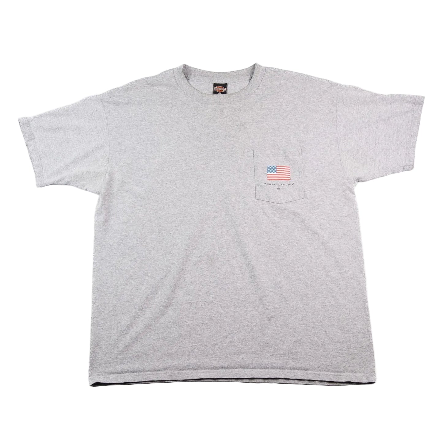 Gray t-shirt with a small American flag patch on a white background