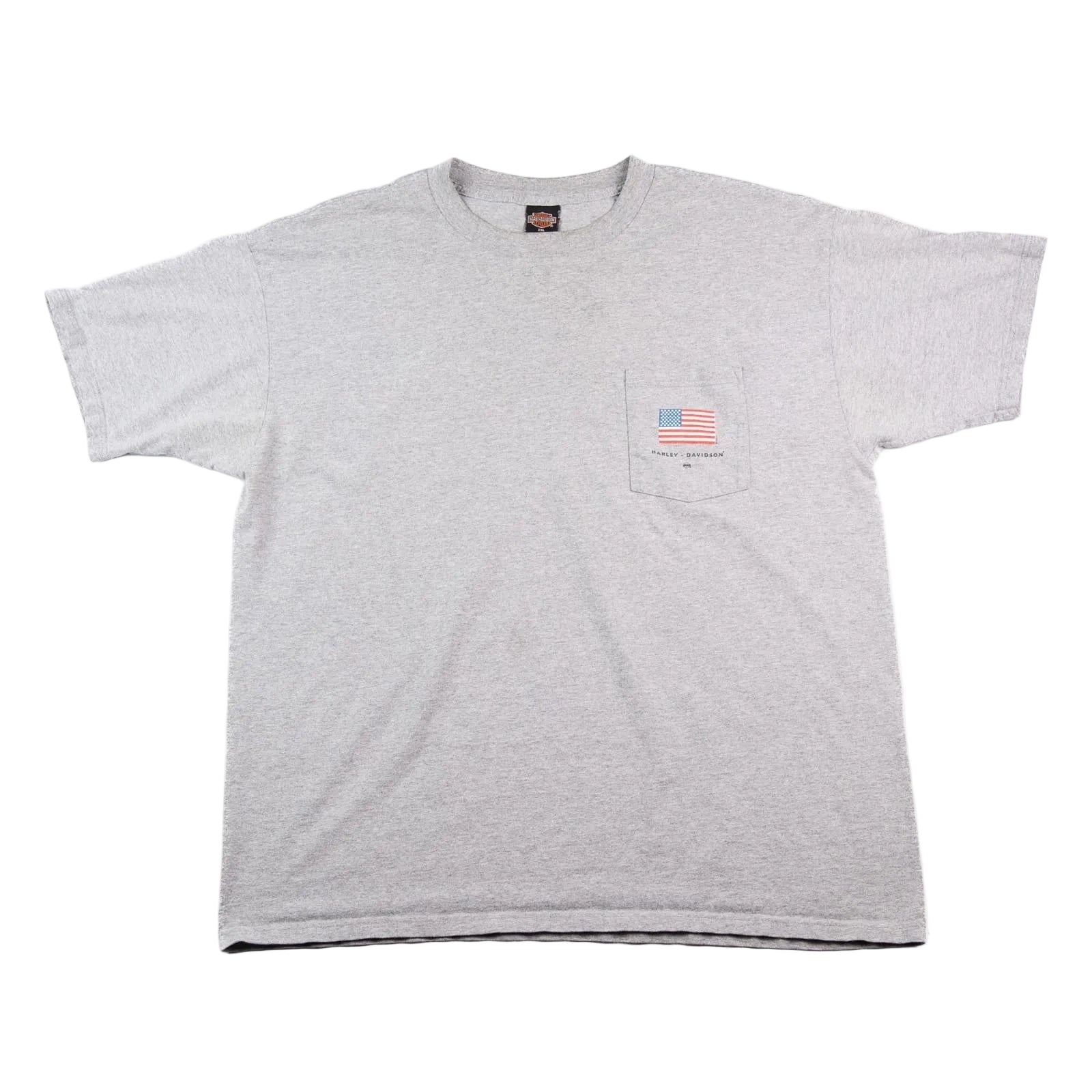 Gray t-shirt with a small American flag patch on a white background