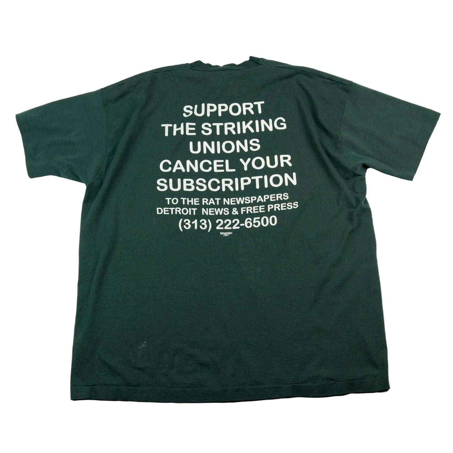 Green t-shirt with white text on a white background