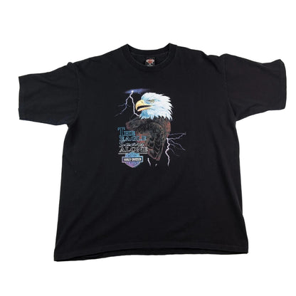 Black t-shirt with an eagle graphic and text on a white background