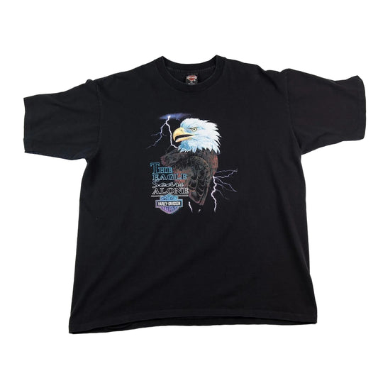 Black t-shirt with an eagle graphic and text on a white background
