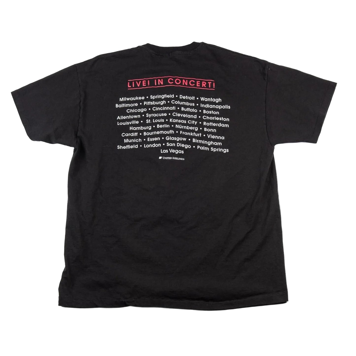 Black t-shirt with concert tour information on a white background