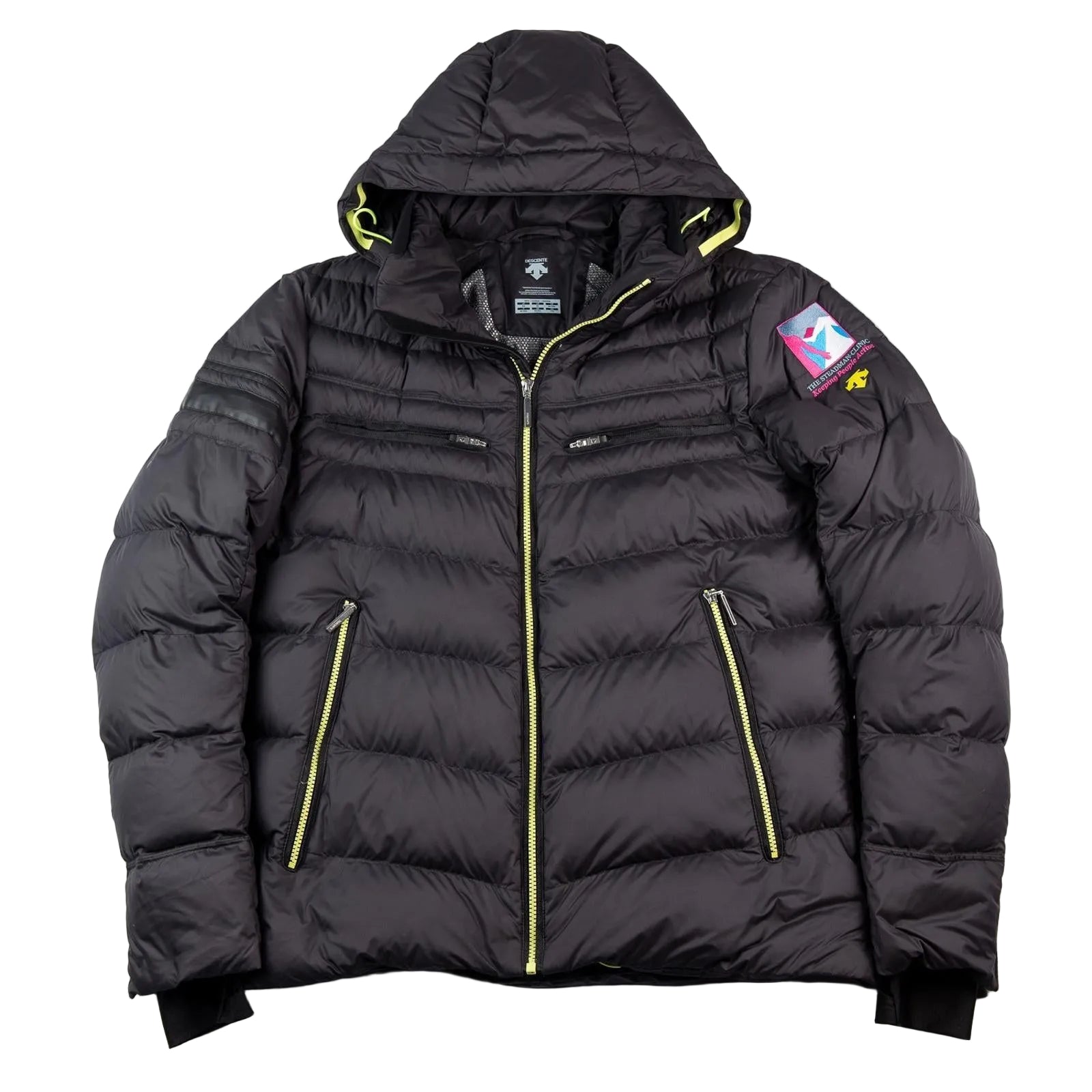 Black puffer jacket with yellow zippers on a white background