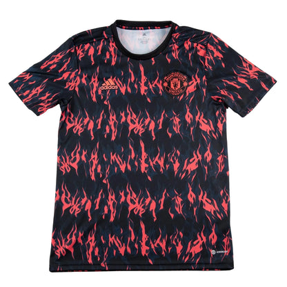 Black sports jersey with red flame pattern and Adidas logo on a white background