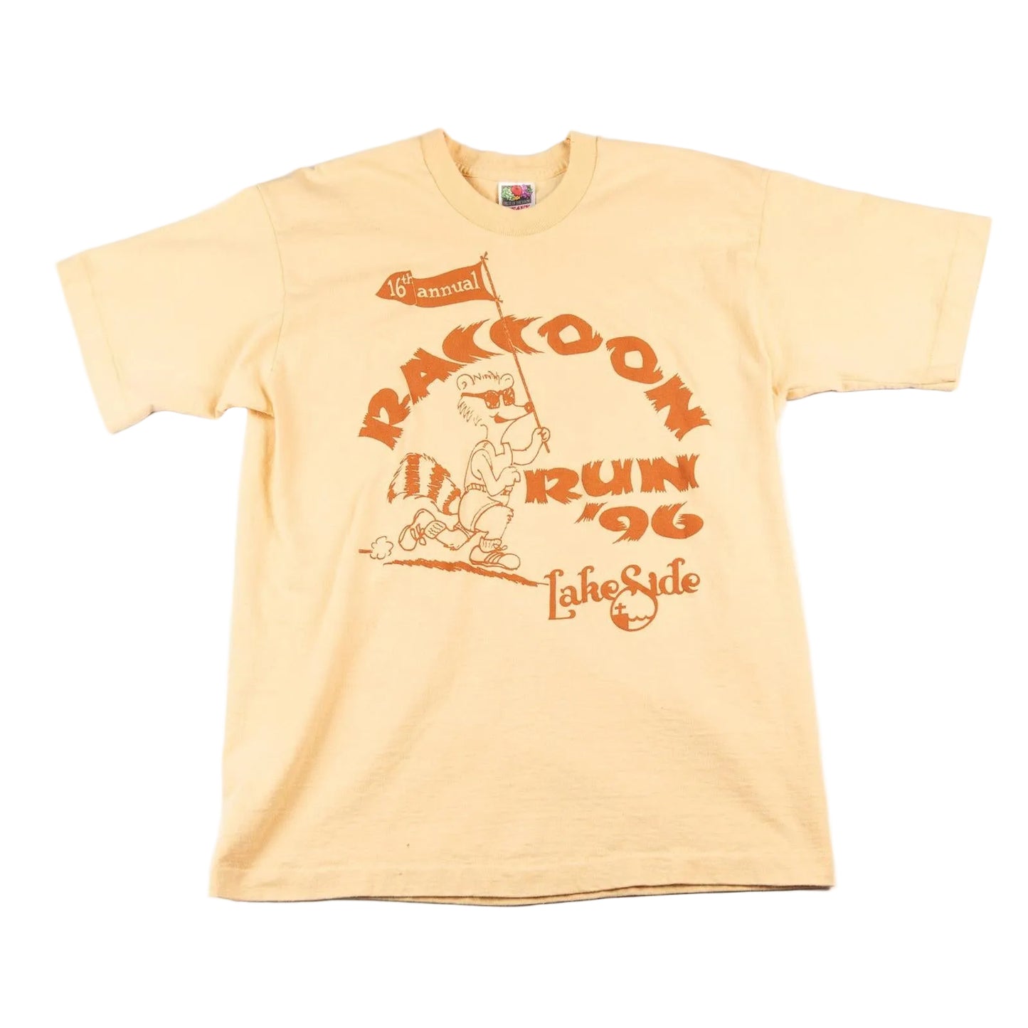 Beige t-shirt with raccoon graphic and text on a white background