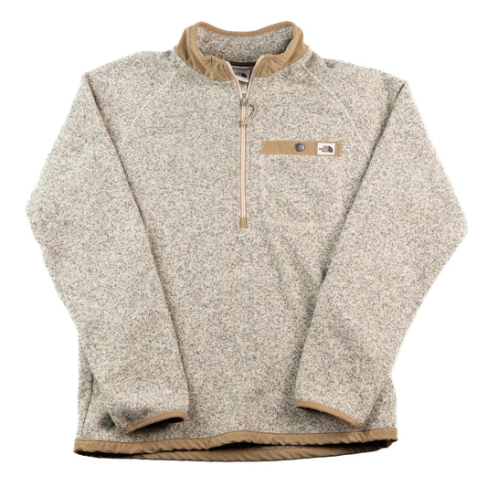 Beige fleece pullover with brown trim on a white background