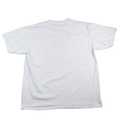 Plain white t-shirt on a light gray background