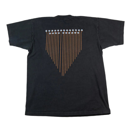 Black t-shirt with a unique design on the back against a white background