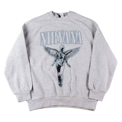 Gray sweatshirt with 'Nirvana' logo and angel graphic on a white background