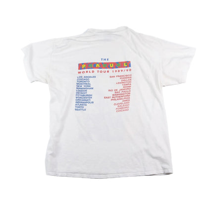 White t-shirt with colorful 'The Spaceman' world tour text on a white background
