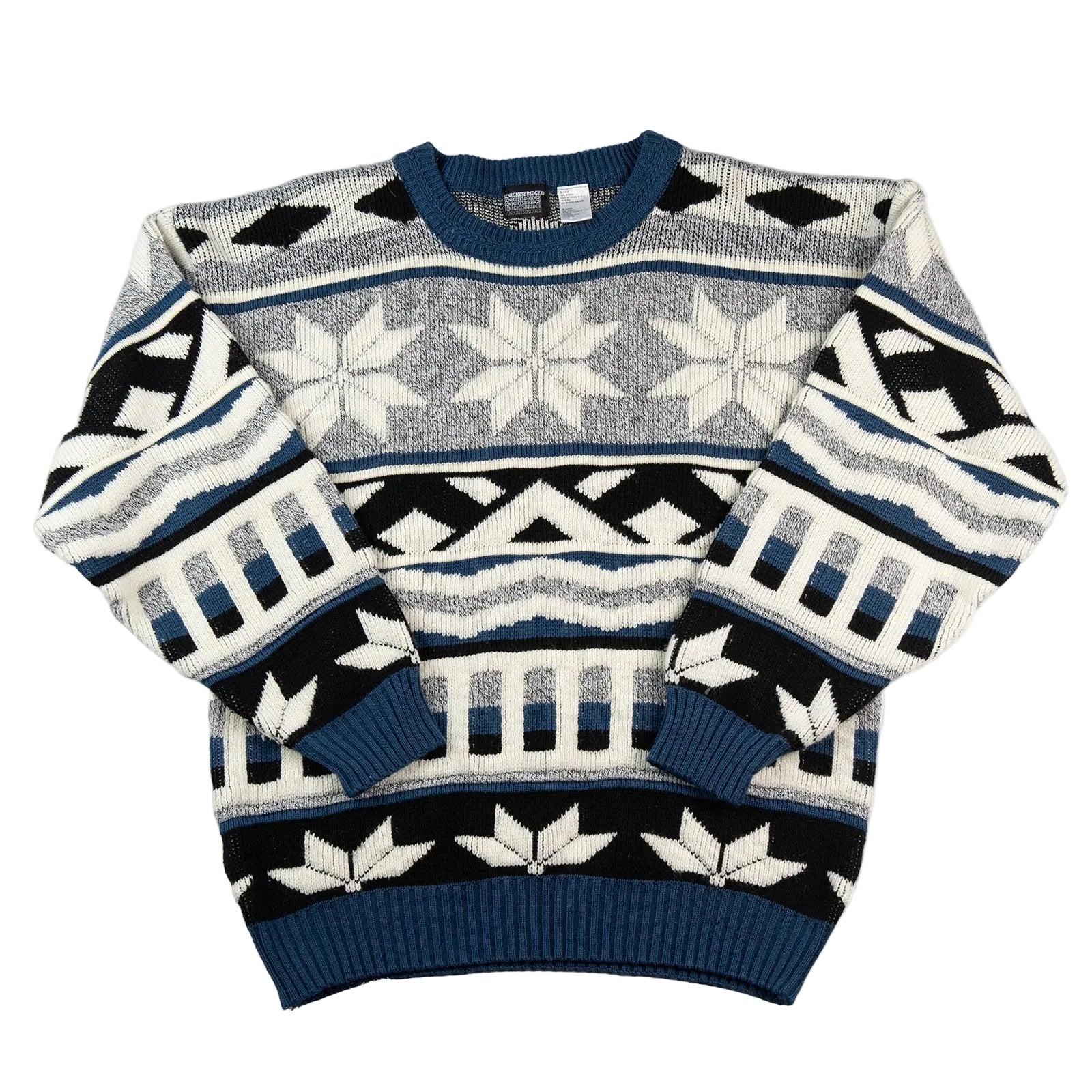Patterned sweater with geometric design on a white background